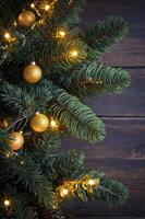 Decorating Christmas Tree with Gold Ornaments and Fairy Lights Festive Scene photo