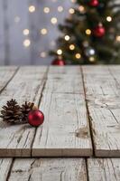 Christmas Decoration on Rustic Wooden Table with Tree and Lights photo