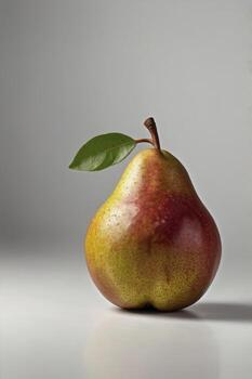 Fresh Pear with Leaf Still Life on White Tabletop Surface photo