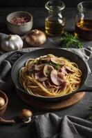 Preparing Spaghetti with Mushroom and Ham in Frying Pan for Dinner photo