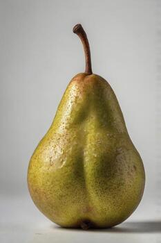Close-up of Fresh Pear with Stem and Water Droplets Still Life photo