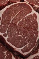 Fresh Beef Chuck Roast Close-up Raw Meat Texture and Marbling photo