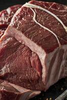 Preparing Raw Beef Roast Ready for Cooking Tied with String photo