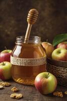 Honey Jar with Dipper and Fresh Apples on Rustic Wooden Table photo
