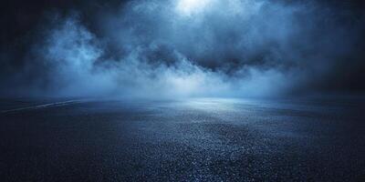 Dark Asphalt Road in Dramatic Fog with Moody Blue Light and Atmospheric Background photo