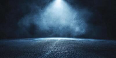 Empty Road with Dramatic Lighting and Fog Creating a Moody Atmosphere photo