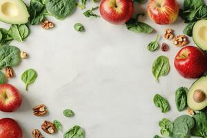 Arrangement of Fresh Apples, Avocado, Spinach, and Walnuts on White Surface photo