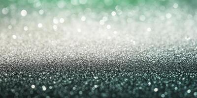 Sparkling Glitter Texture with Teal and Silver Bokeh Light Background photo