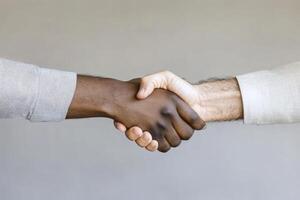 Diverse Hands Shaking in Agreement Symbolizing Partnership and Business Collaboration photo