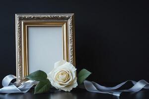 Golden Frame with White Rose and Ribbon on Dark Background Display photo
