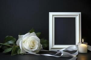White Rose and Candle with Frame on Dark Background Arrangement photo
