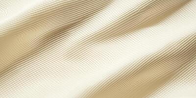 Close-up Cream Waffle Fabric Texture with Soft Waves and Subtle Lines photo
