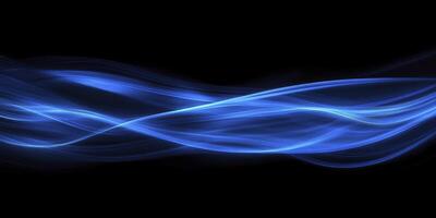 Abstract Blue Light Streaks Flowing Across a Black Background Image photo