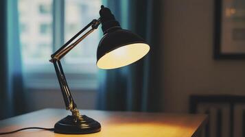 Desk Lamp Illuminating Workspace Table with Warm Light in Home Setting photo
