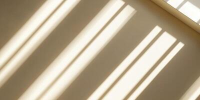 Sunlight Streaming Through Window Casting Shadows on Neutral Colored Wall photo