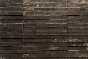 Dark Brown Stone Tile Wall Texture Background with Horizontal Lines photo