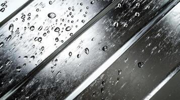 Water Droplets on Metal Surface with Shiny Texture After Rain photo
