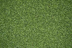Artificial Green Grass Texture Background Full Frame Top View photo