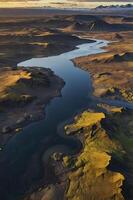 Aerial View of Winding River Through Iceland Landscape at Golden Hour photo