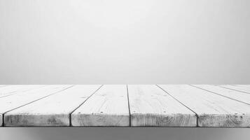 Empty White Wooden Table Against Plain Gray Background for Product Display photo