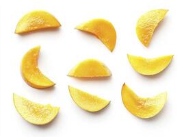 Arrangement of Fresh Mango Slices on White Background Overhead View photo