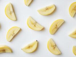 Banana Slices Pattern on White Background Close Up Fresh and Simple photo