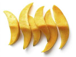 Arrangement of Mango Slices on White Background for Healthy Eating photo