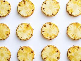 Pineapple Slices Pattern on White Background, Fresh and Tropical Food photo