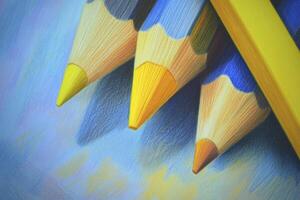 Close-up of Colored Pencils on Textured Paper for Art and Design photo
