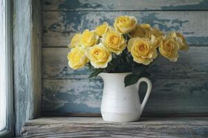Yellow Roses Bouquet in White Pitcher on Rustic Window Sill photo