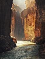 Navigating River Through Grand Canyon Walls with Sunlight Streaking Through photo