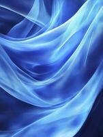 Flowing Blue Fabric Creates Abstract Wave Pattern Background Texture Design photo