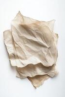 Vintage Parchment Paper Stack with Burned Edges on White Background photo