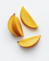 Fresh Mango Slices on White Background Perfect for Healthy Eating photo