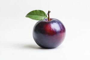 Ripe Plum with Leaf on White Background Close Up Still Life photo
