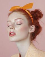 Redhead Woman with Freckles Wearing Orange Bow and Pastel Makeup photo