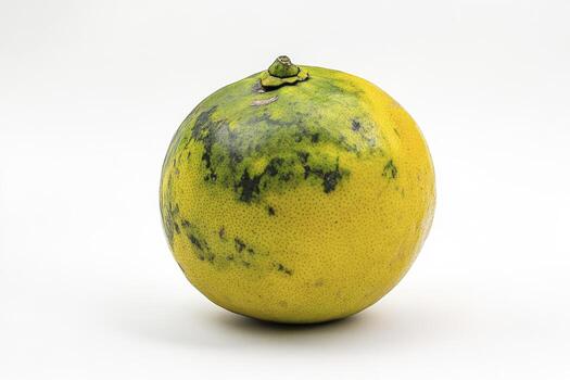 Close-up of a Pomelo Fruit on a White Background for Healthy Eating photo