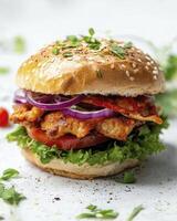 Delicious Homemade Burger with Fresh Vegetables and Chicken Fillet photo
