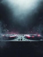 Dj Mixing Console with Smoke and Red Lighting for Music Performance photo
