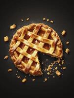 Serving of Homemade Apple Pie with Lattice Crust and Crumbs photo