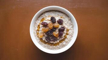 Oatmeal with raisins and oats photo