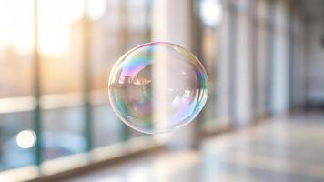A large bubble floating in front of a large window photo