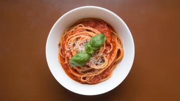 Italian spaghetti with tomato sauce and basil photo