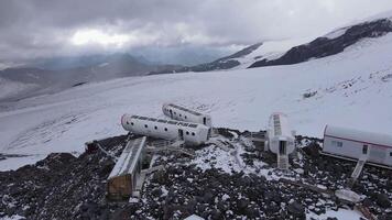 Aerial view of snow-covered mountain slopes and glacier on Elbrus video