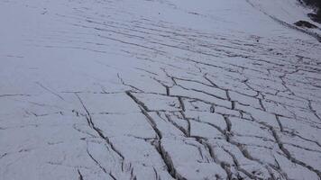 Aerial view of a fractured glacier on the slopes of Elbrus mountain video