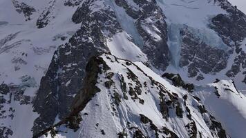 Sharp mountain ridges with snow patches in the Caucasus video