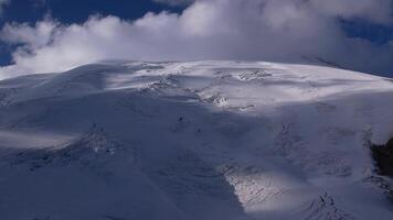 Aerial view of Elbrus peak covered in snow and ice formations video