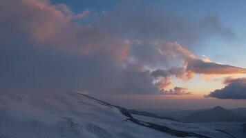 Scenic view of Elbrus glaciers glowing in the last light of day video