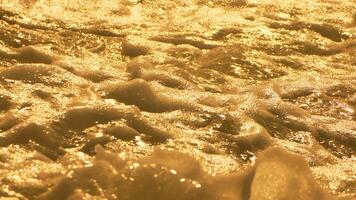 Cave Wall Texture Gold Rock - A close-up of a gold-colored cave wall with a textured surface. photo