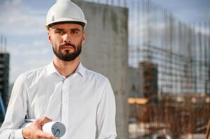 Portrait, of man that is in uniform on the ,construction site photo